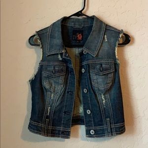 denim vest with ripped style